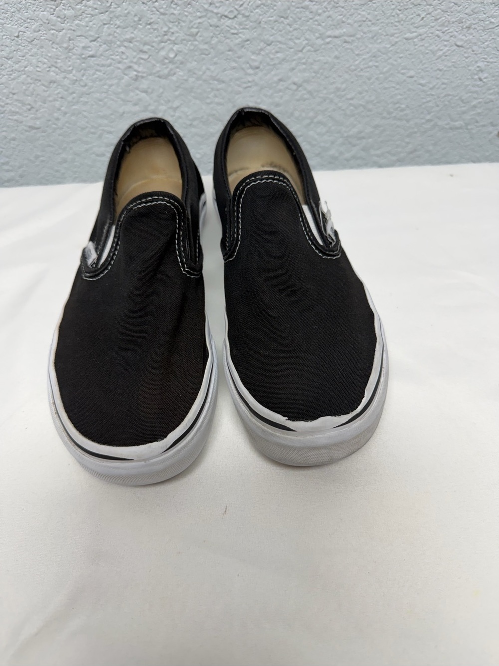 Vans Kids Black Slip-On Sneakers with White Soles